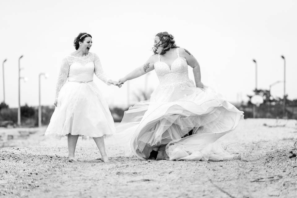 Brides walking on beach