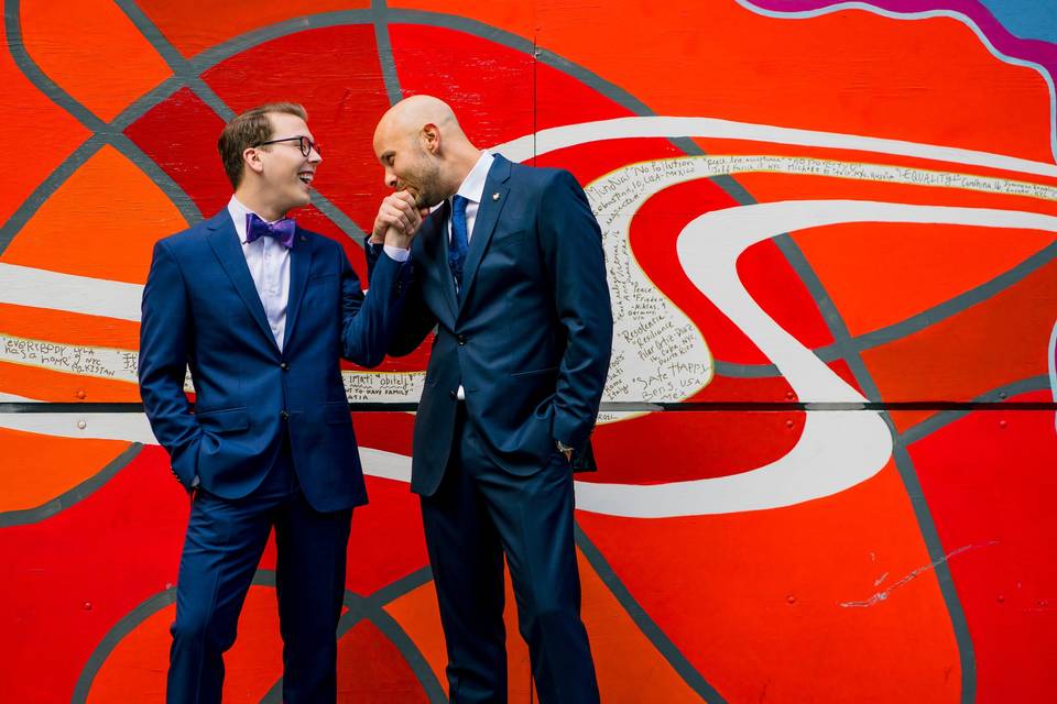 Grooms kissing hand