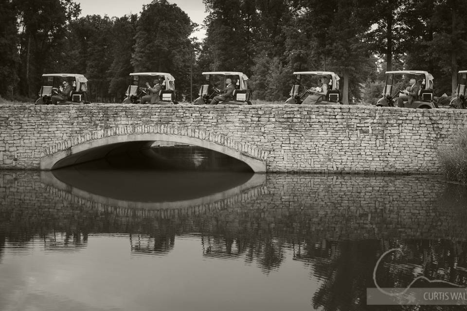 Golf carts on the stone bridge