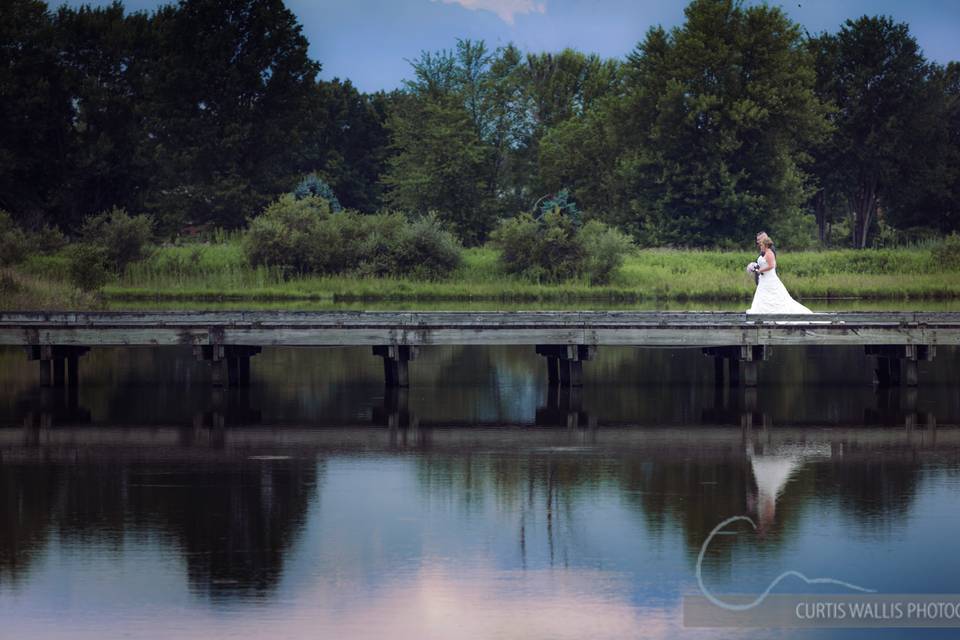 Bride and groom on the long bridge