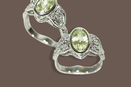 His celestial treasure features a 2.26 carat fine oval chrysoberyl with 6 round diamonds totalling 0.08 carats (E-F/VS) set individually and 36 tiny diamonds totalling 0.08 carats (E-F/VS) are pavé set into this platinum ring.
