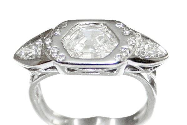 Elegant and sleek design perfect as a wedding ring or engagement ring. All clear, white diamonds set in platinum.