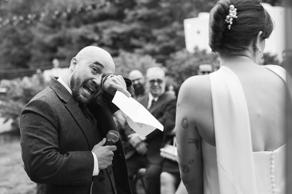 Groom crying at ceremony