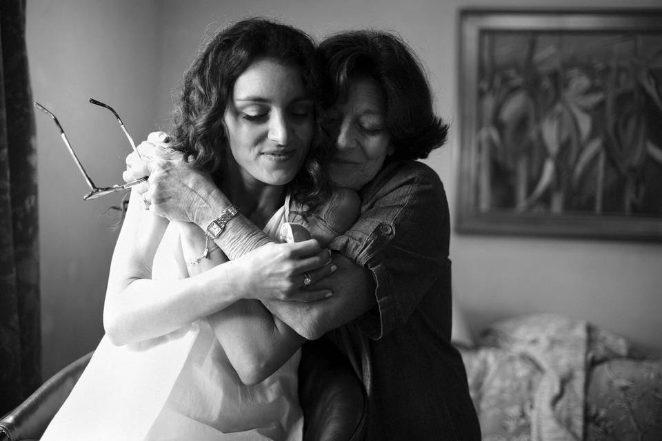 Mother and daughter hug