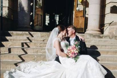 Kissing by the stairs