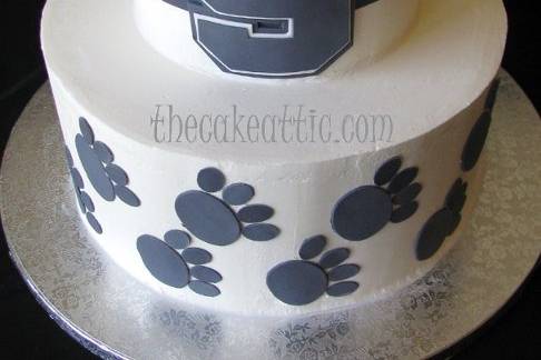 Buttercream cake with sugar paste decorations for a Penn State alumnus.