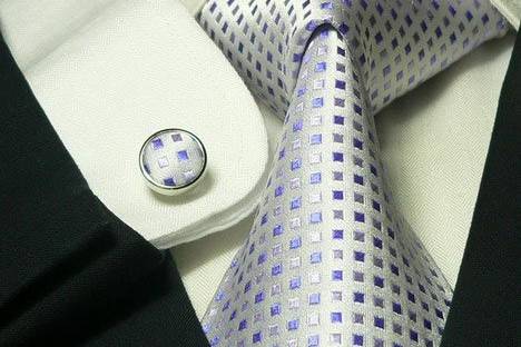 purple  polka dot wedding tie set everything matching including cufflinks.