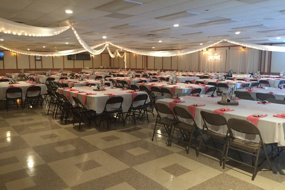 Ceiling draping, linens and centerpieces at the Rostraver Fire Hall