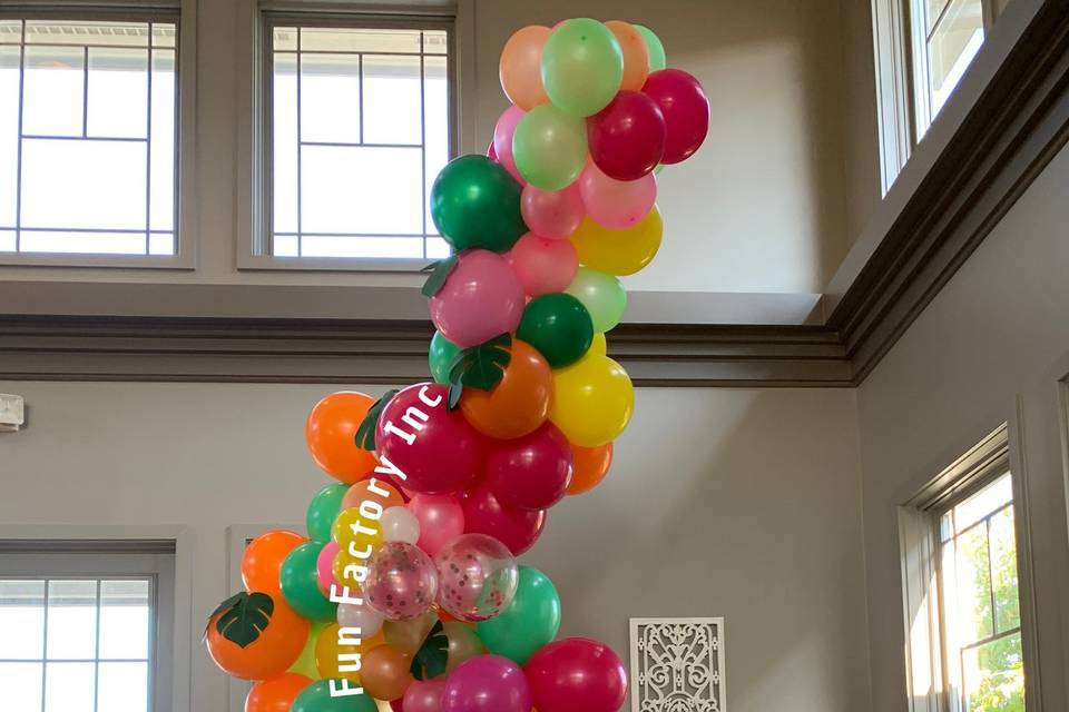 Tropical theme balloon arch