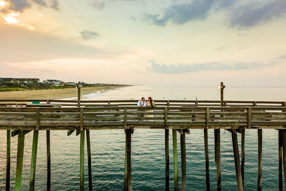 Lovebirds and pier view