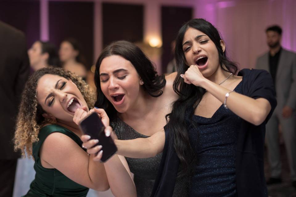 Wedding guests dancing.