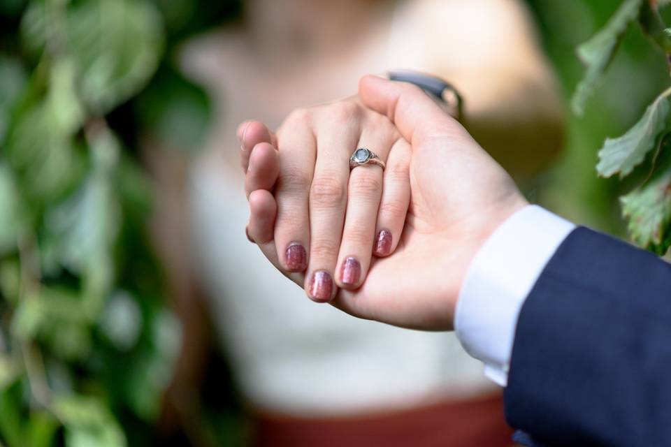 Closeup of bride's hand, ring.