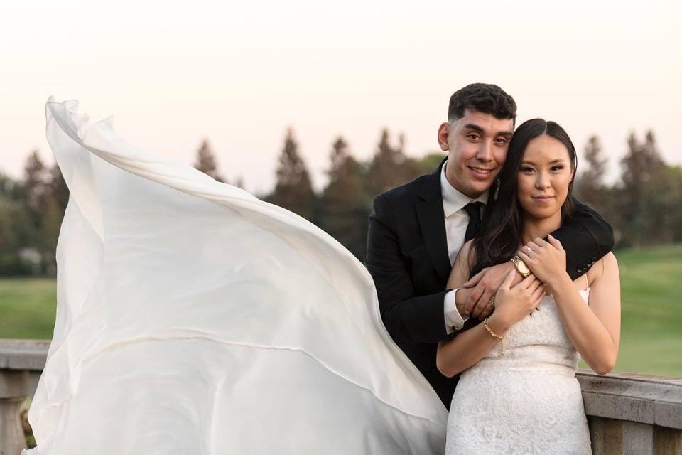 Bride dress blowing in wind.