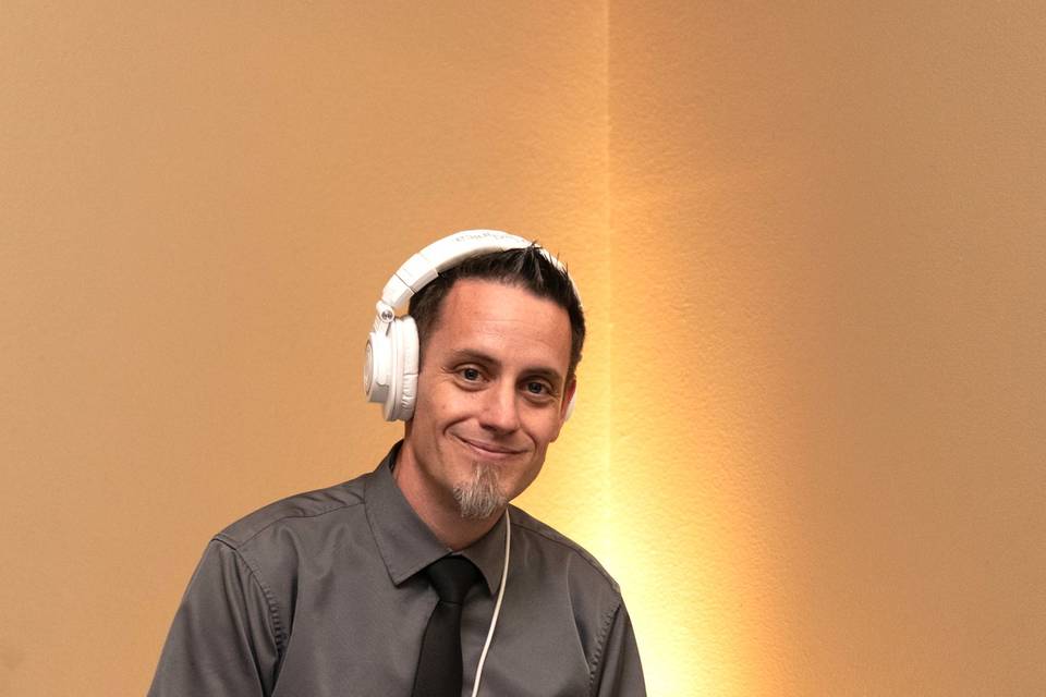 DJ, Emcee smiling.