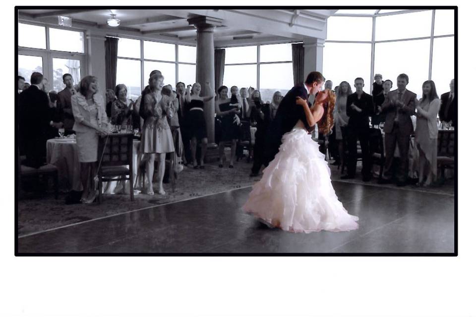 First Dance at the Beach and Tennis Club, Pebble Beach, California. The photographers flash lit up this frame of the video and I decided it would be more dramatic to make the rest of the photo black and white.