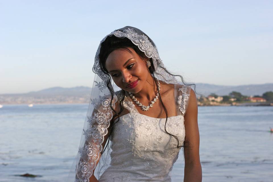 Modest bride at Lovers Point, Pacific Grove, California on the Monterey Bay.