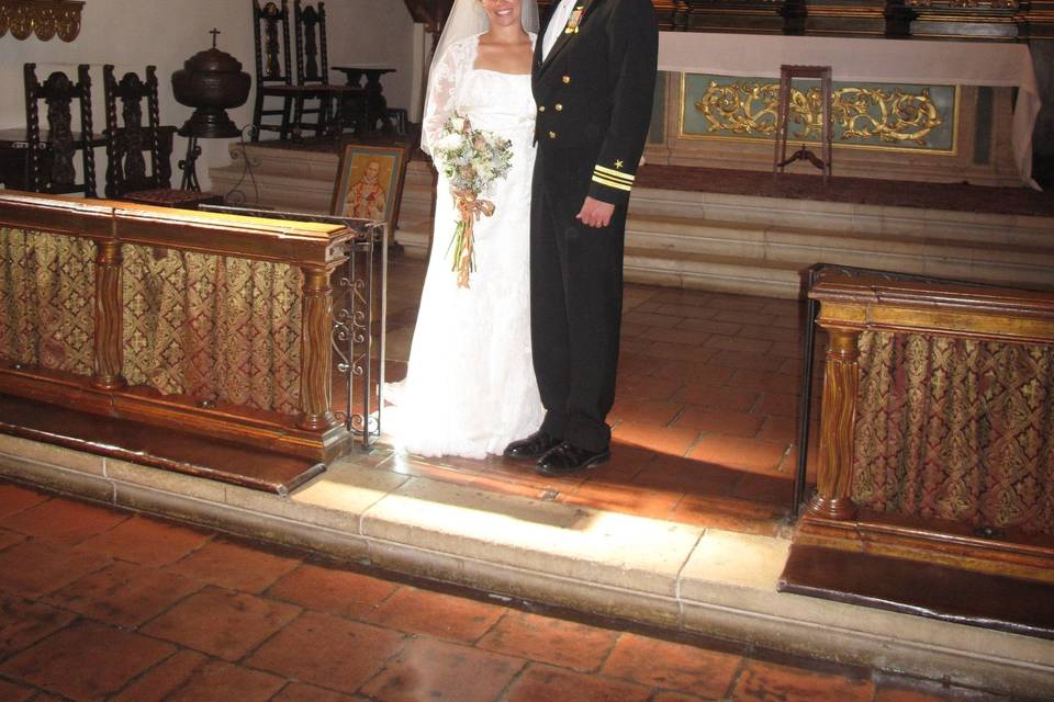 Wedding couple shown after ceremony at Carmel Mission Basilica, Carmel, California.
