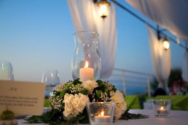 Romantic centerpiece with flowers and candles