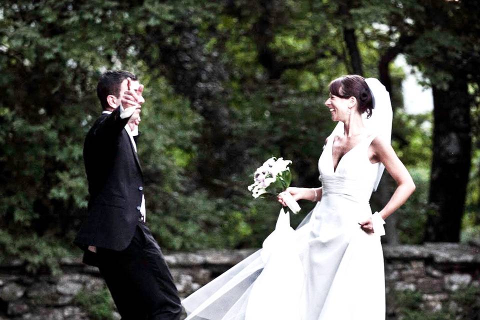 Bride and groom dance in the garden