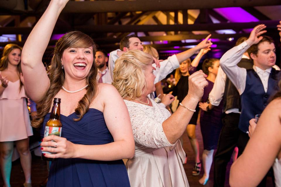 Bride dancing and drinking