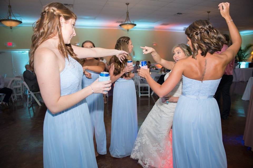 Bride and bridesmaids partying at the dance floor