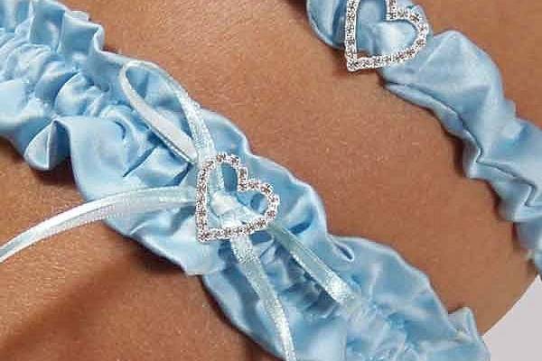 Your 'something blue' has never looked more regal than with our Blue Crush Wedding Garter. Brilliant blue satin provides the base for this gorgeous bridal accessory and features a double layered bow and crystal heart. With its dual color pallet and elegant appearance, this garter is sure to please! Available in blue only. Includes a free tossing garter