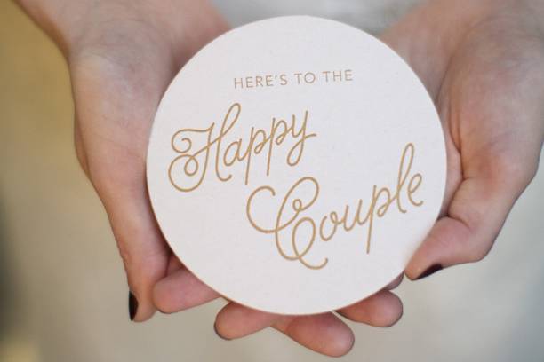 Coasters make great wedding favors. These can be customized to match your invites or decor.Photo by Ember Grove Photography