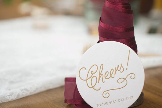 Coasters make great wedding favors. These can be customized to match your invites or decor.Photo by Ember Grove Photography