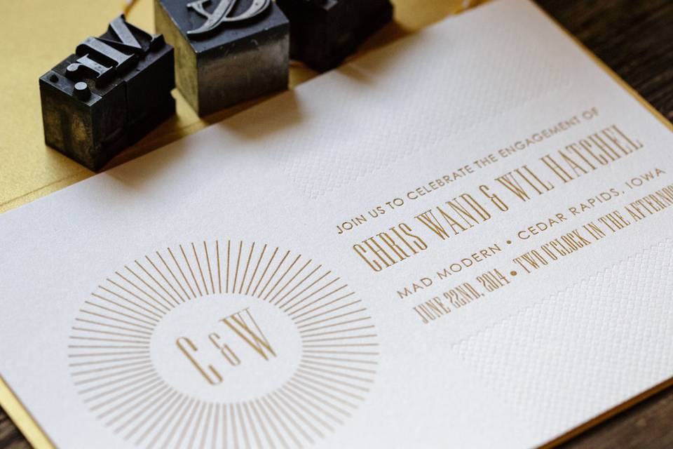 Metallic gold ink and blind impression letterpress, for a modern take on wedding invites.