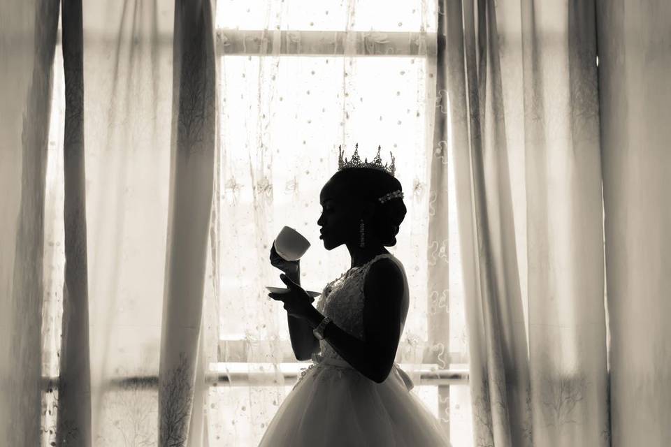 Bride drinking from her cup