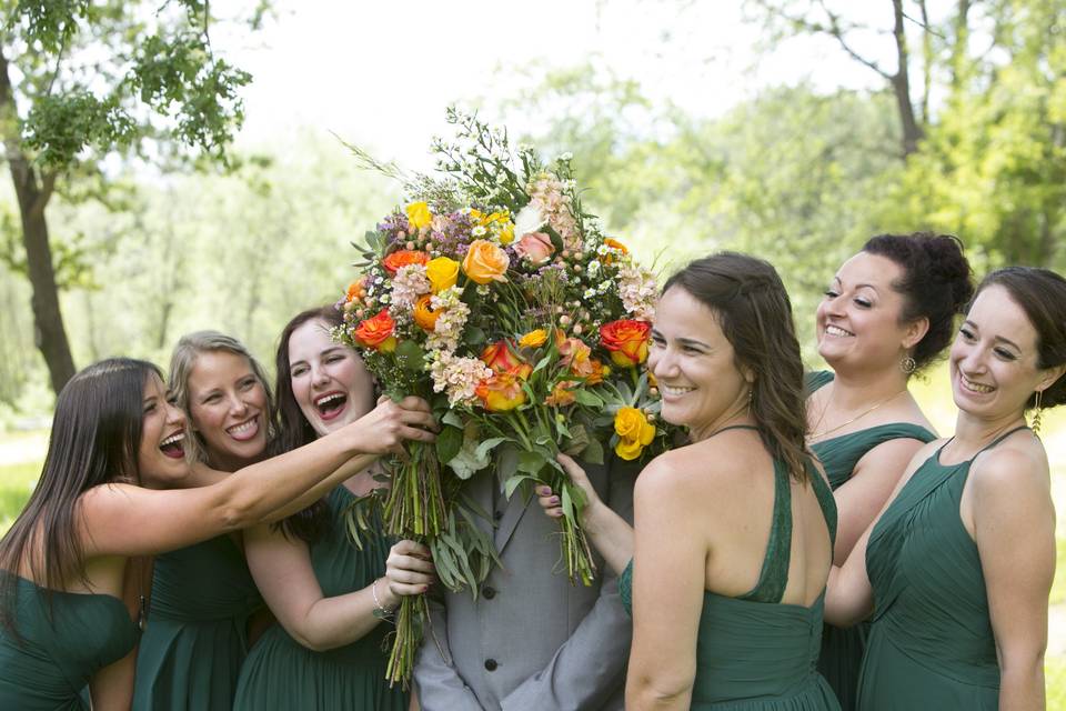 Bridesmaids and the groom