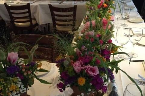 Moss and birch add natural and organic elements to this tablescape