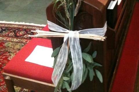 Wheat and seeded eucalyptus pew decor for the Autumn season.