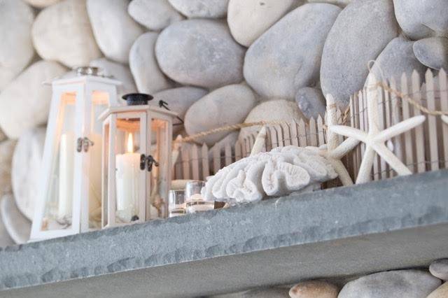 Nautical themed accessories adore the mantel. All part of styling your special day.