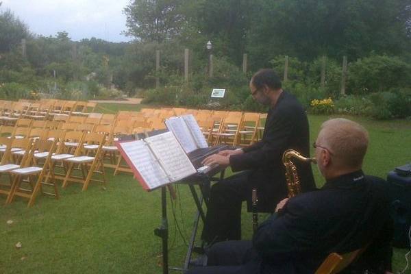 My guy's tuning up for the ceremony at Atlanta Botanical Gardens