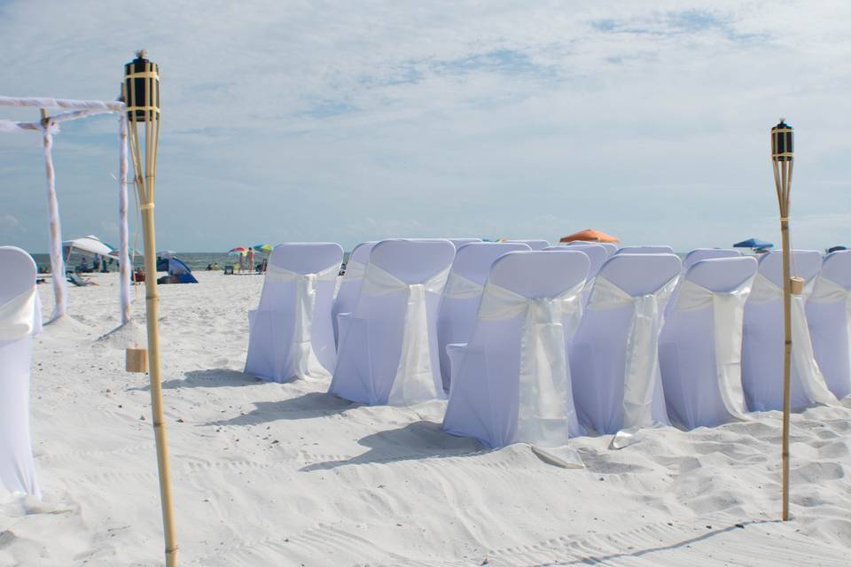 Spandex chair covers w/ champagne colored sashes... So elegant!