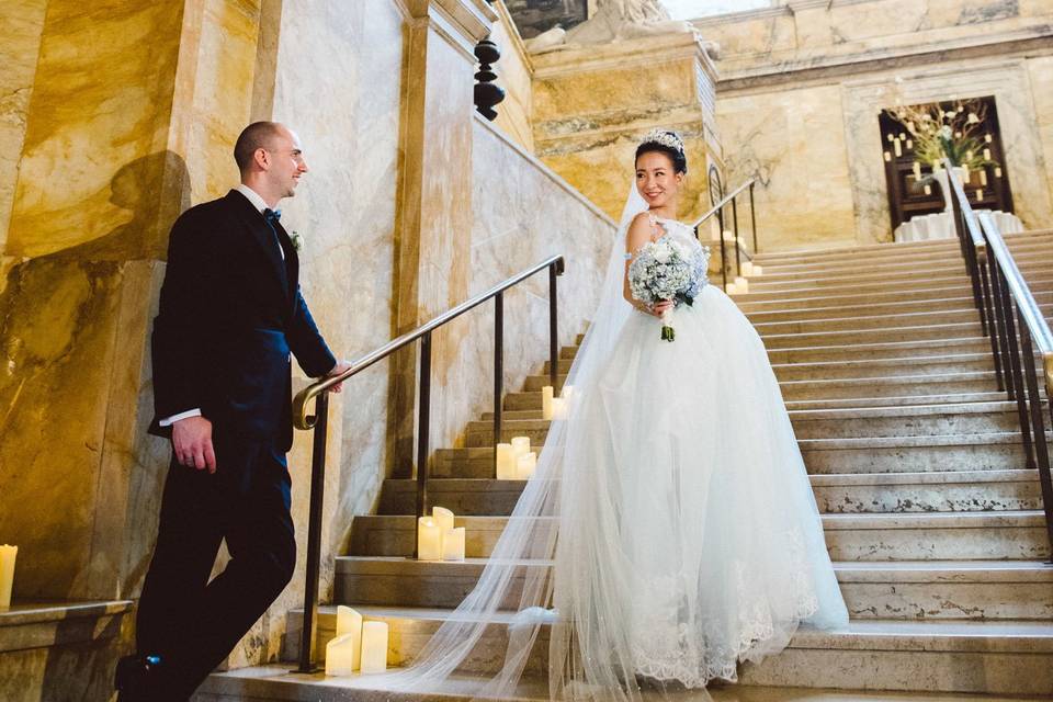 Couple by the grand staircase