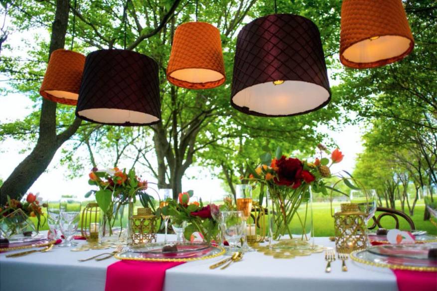 Outdoor reception table setup and decor