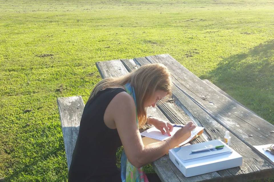 Signing a marriage license for an elopement at a Montgomery County Park