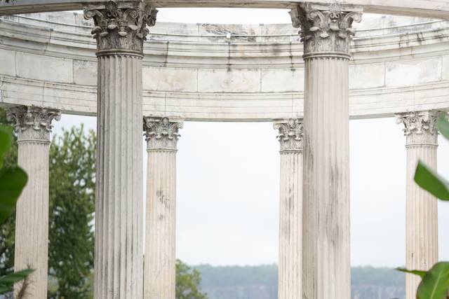 Venue portrait at Untermyer Gardens, Yonkers, NY – the stunning classical columns of the garden temple frame an expansive view of the Hudson Valley.