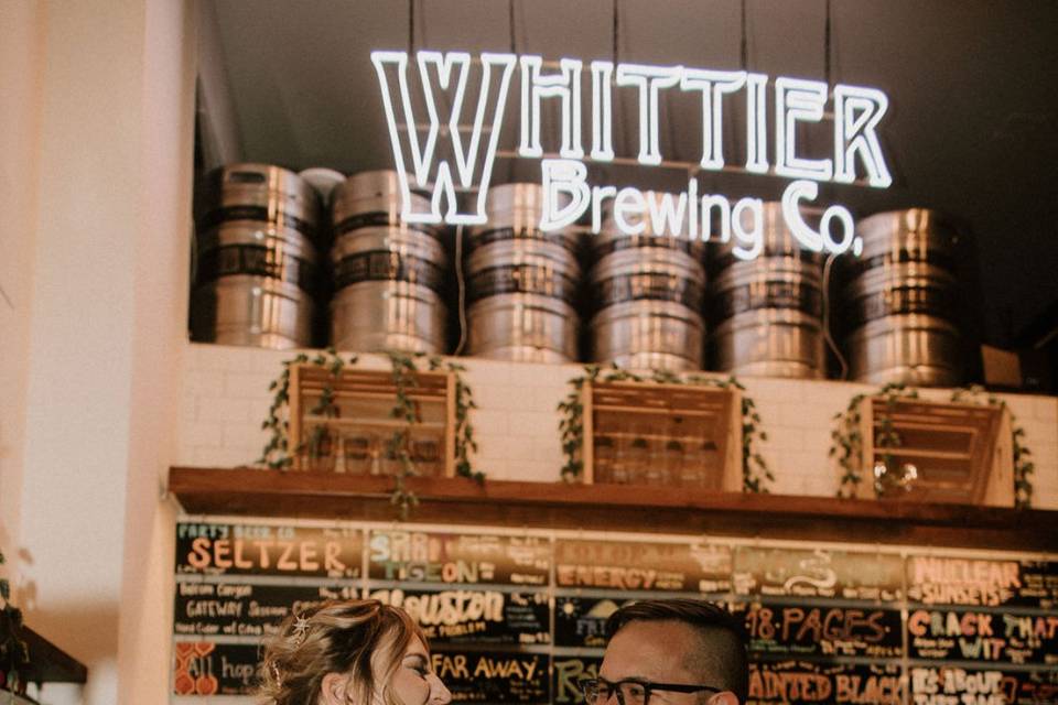 Bride and Groom pour Beer