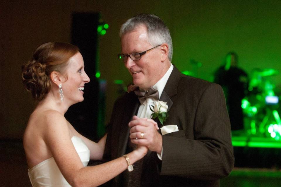 The bride and father dance