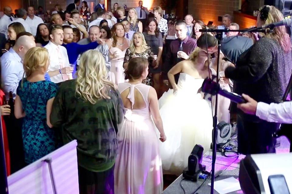 What a fairy tale wedding complete with a kiss from the stage.