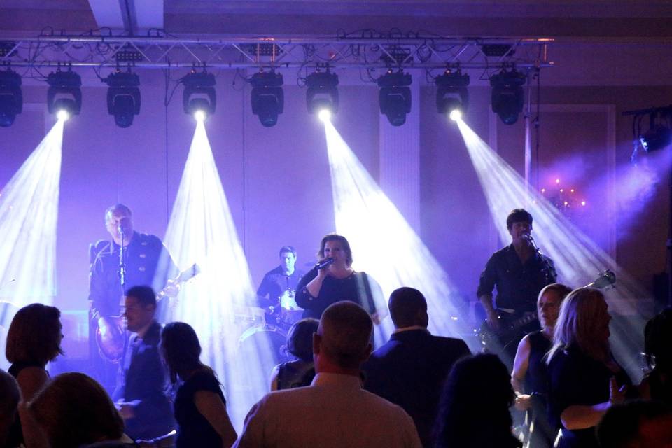 Lisa Rene Band on stage with our one of our big lighting packages.  Lighting adds so much energy to an event and we can provide small lighting to concert sized lighting. One stop shopping!