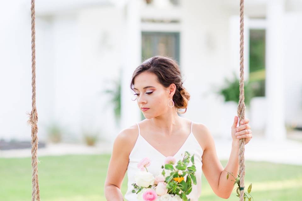 Bride on swing - Chandelier of Gruene