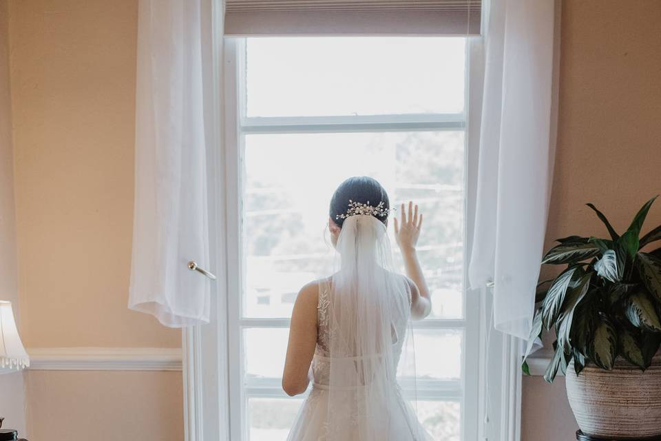 Bride by window