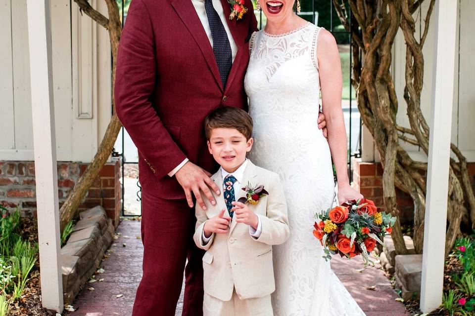 Bride and groom with son