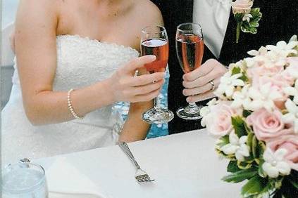 Bride and groom toasting their special day