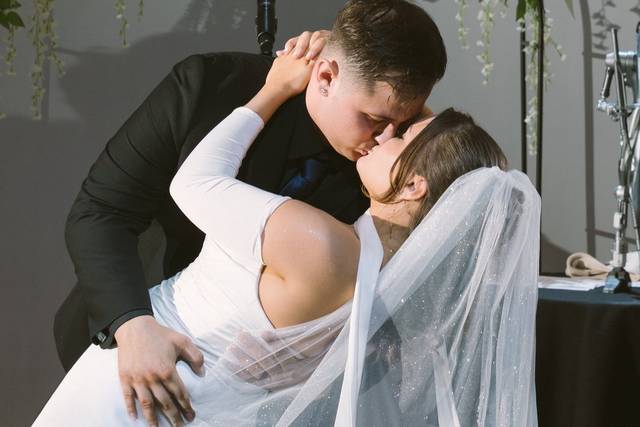 Bride and groom dip kiss