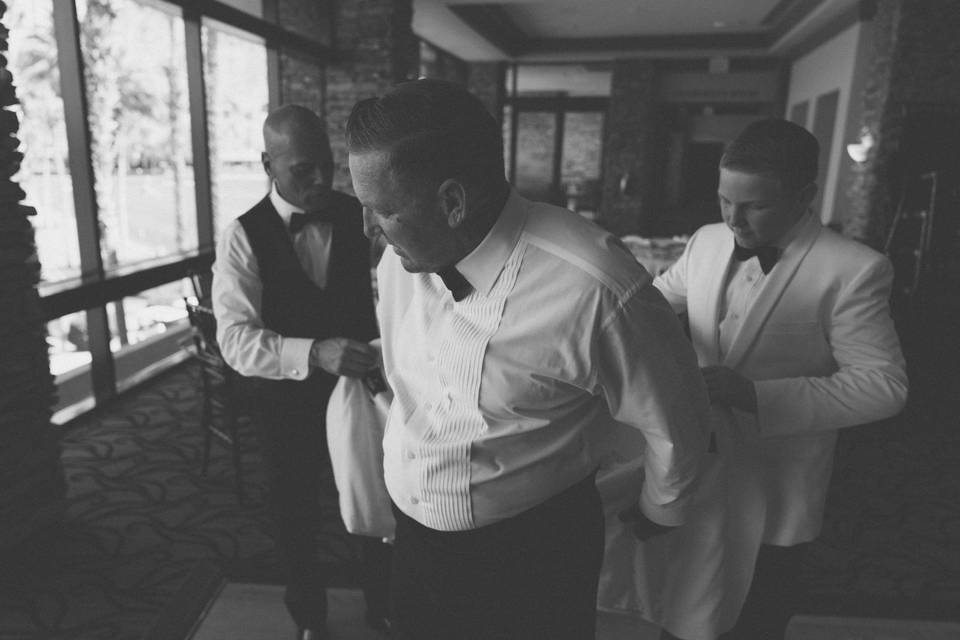 Son and best man with groom